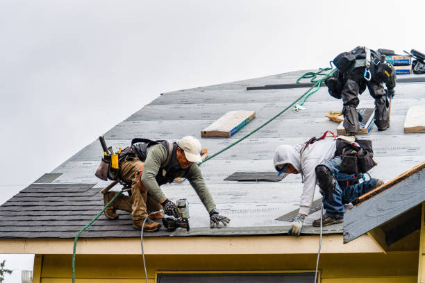Professional Roofing technician working in Harperville, MS